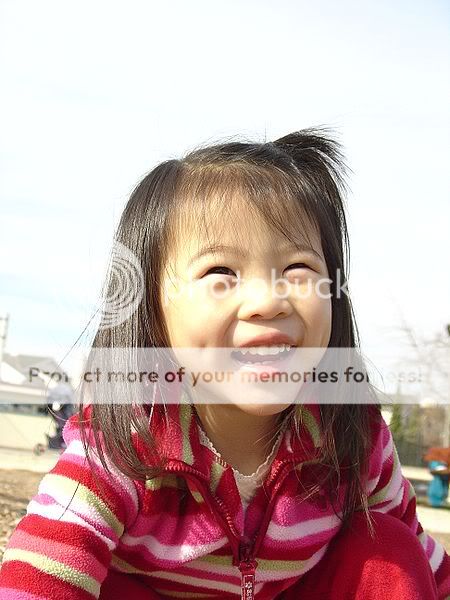 450px-Asian_girl_with_dimples.jpg